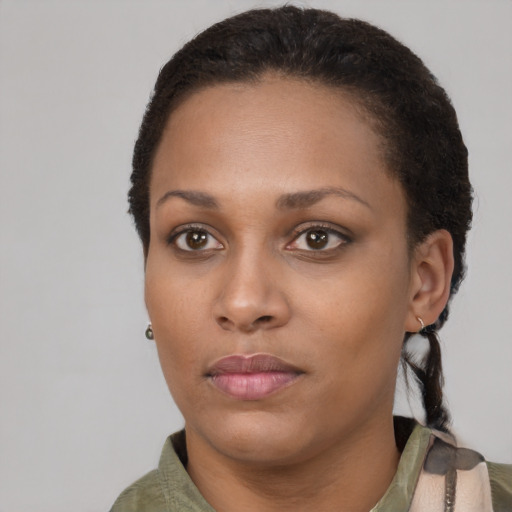 Neutral black young-adult female with short  brown hair and brown eyes
