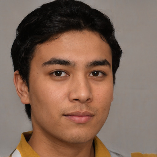Neutral asian young-adult male with short  brown hair and brown eyes