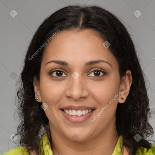 Joyful latino young-adult female with medium  brown hair and brown eyes