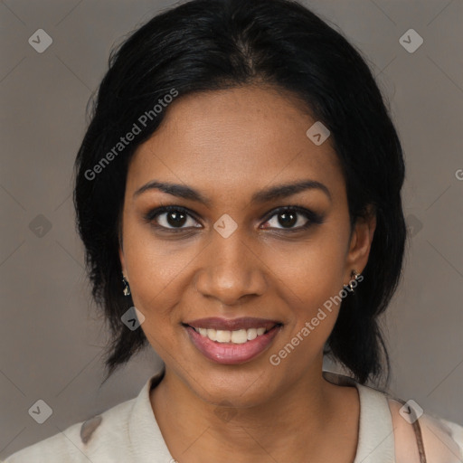 Joyful black young-adult female with medium  black hair and brown eyes