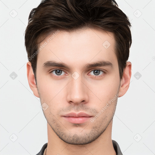 Neutral white young-adult male with short  brown hair and brown eyes