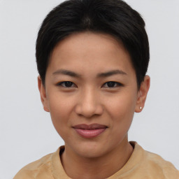 Joyful asian young-adult female with short  black hair and brown eyes