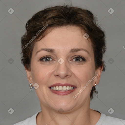 Joyful white adult female with short  brown hair and brown eyes