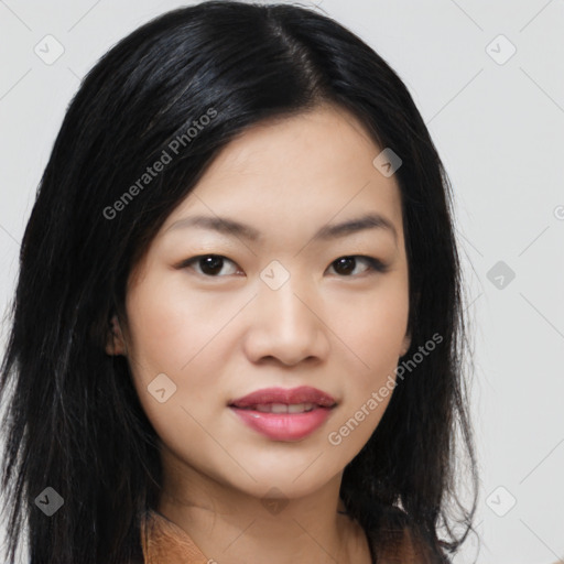 Joyful asian young-adult female with long  black hair and brown eyes