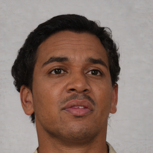 Neutral black adult male with short  brown hair and brown eyes