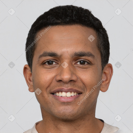 Joyful latino young-adult male with short  black hair and brown eyes