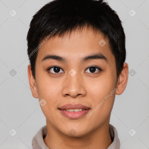 Joyful asian young-adult male with short  brown hair and brown eyes