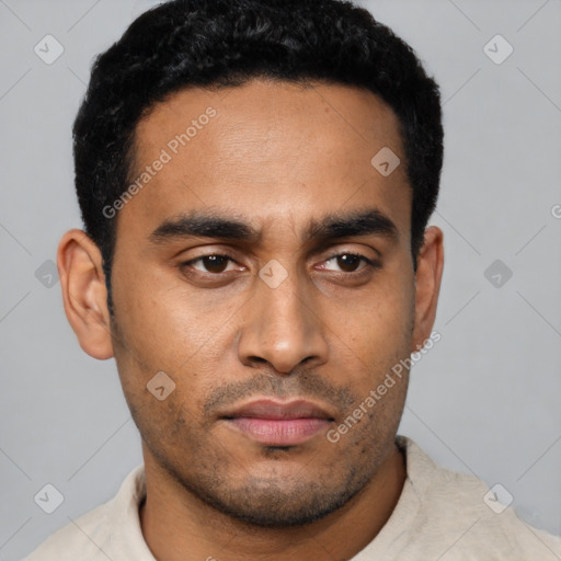 Neutral latino young-adult male with short  black hair and brown eyes