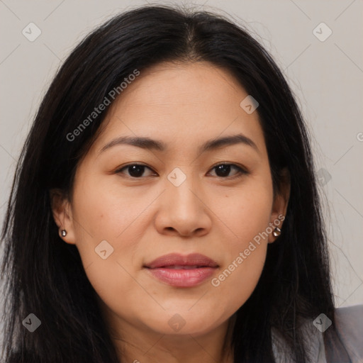 Joyful asian young-adult female with long  brown hair and brown eyes