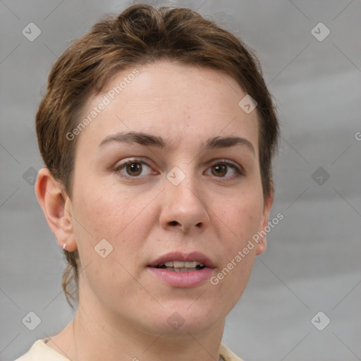 Joyful white young-adult female with short  brown hair and grey eyes