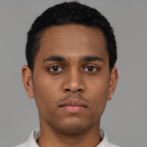 Neutral black young-adult male with short  black hair and brown eyes