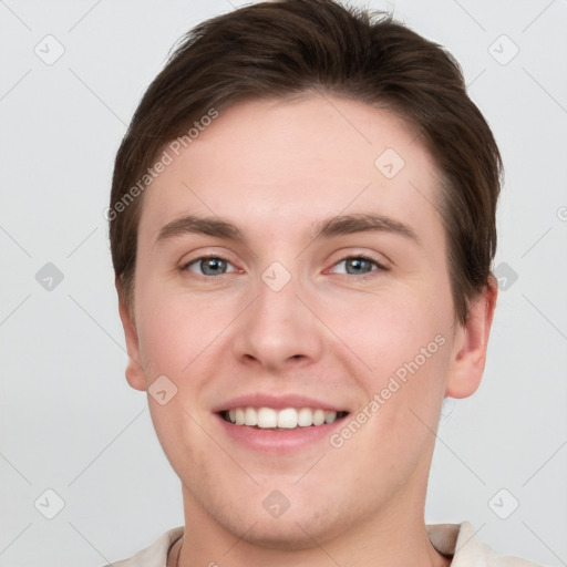 Joyful white young-adult female with short  brown hair and grey eyes