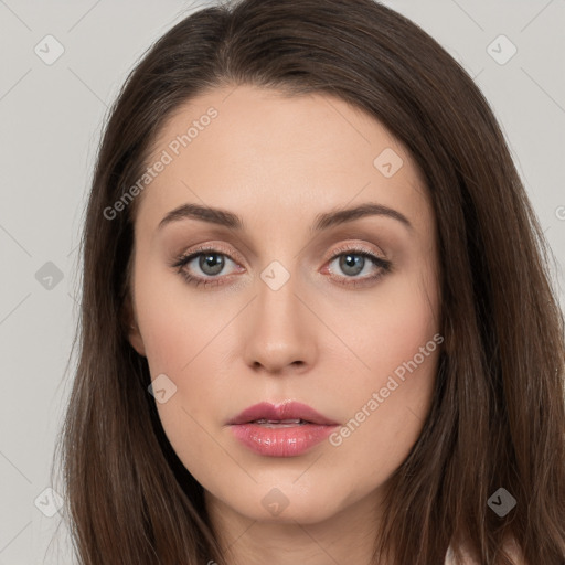 Neutral white young-adult female with long  brown hair and brown eyes