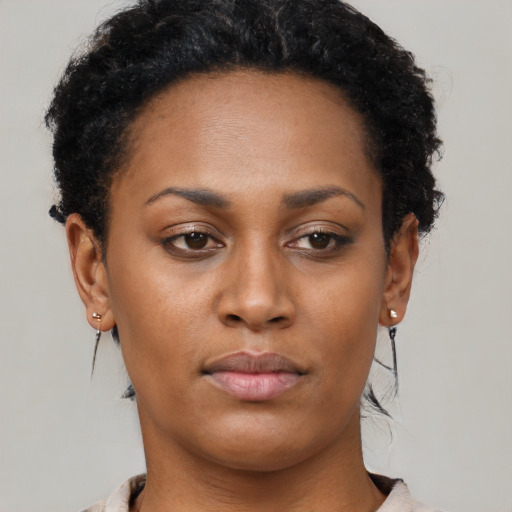 Neutral black young-adult female with short  black hair and brown eyes