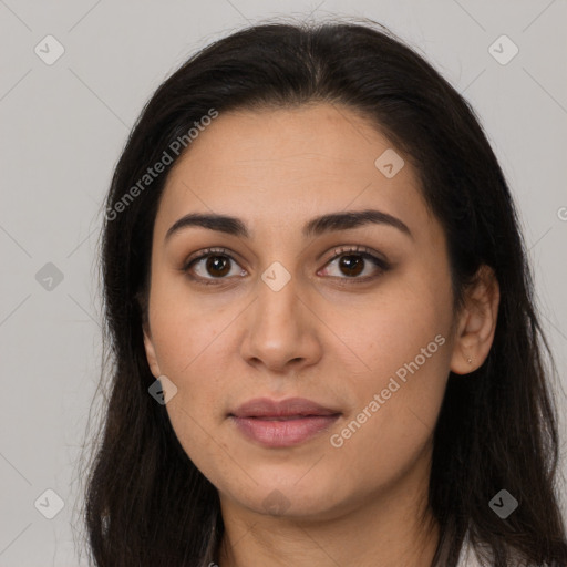 Joyful latino young-adult female with long  brown hair and brown eyes