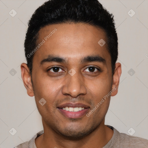 Joyful latino young-adult male with short  black hair and brown eyes