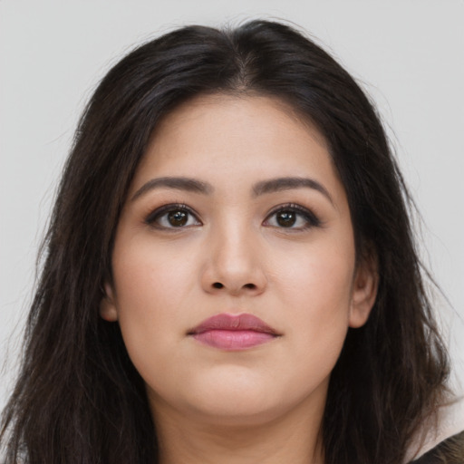 Neutral latino young-adult female with long  brown hair and brown eyes