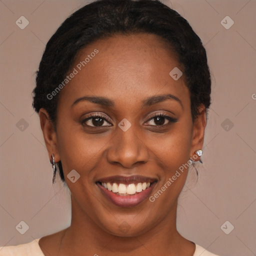 Joyful black young-adult female with medium  brown hair and brown eyes