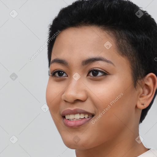 Joyful black young-adult female with short  brown hair and brown eyes