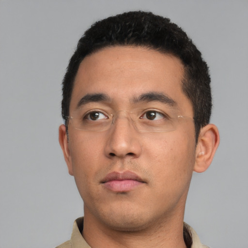 Neutral white young-adult male with short  black hair and brown eyes