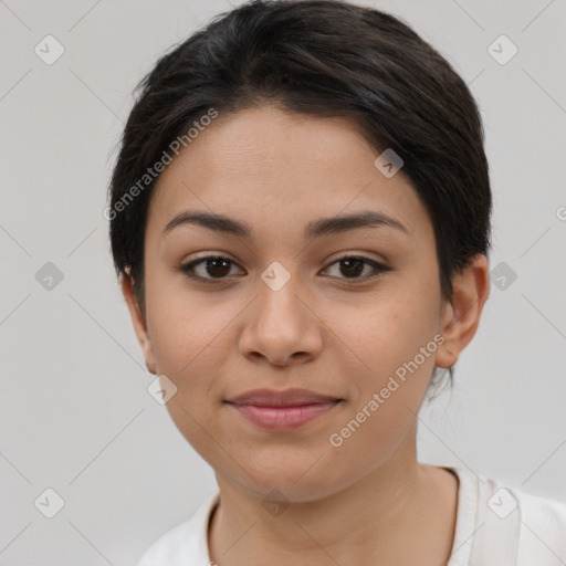 Joyful latino young-adult female with short  brown hair and brown eyes