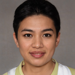 Joyful asian young-adult female with short  brown hair and brown eyes