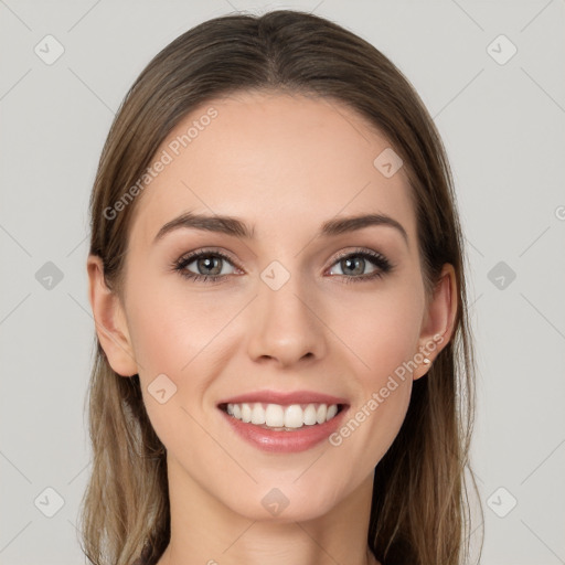 Joyful white young-adult female with long  brown hair and grey eyes