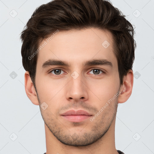 Neutral white young-adult male with short  brown hair and brown eyes