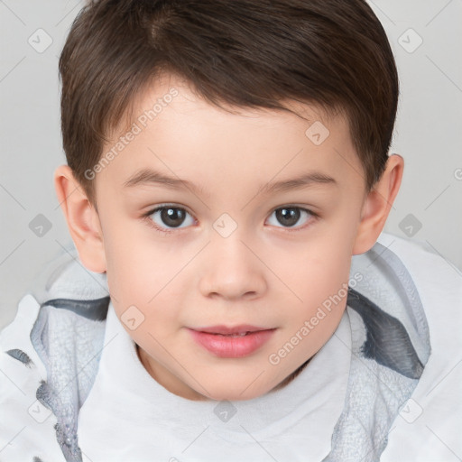 Joyful white child male with short  brown hair and brown eyes