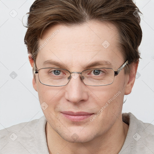 Joyful white adult female with short  brown hair and grey eyes