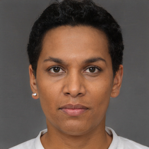 Neutral black young-adult female with short  black hair and brown eyes