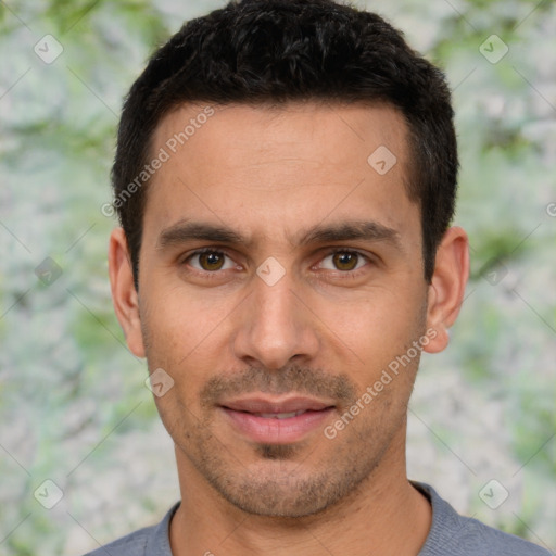 Joyful white young-adult male with short  brown hair and brown eyes