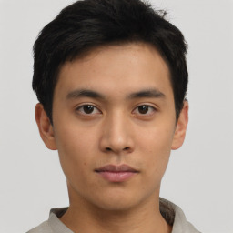 Neutral asian young-adult male with short  brown hair and brown eyes