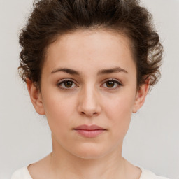 Neutral white young-adult female with short  brown hair and brown eyes