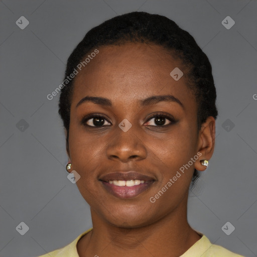 Joyful black young-adult female with short  black hair and brown eyes