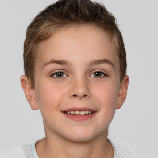 Joyful white child female with short  brown hair and brown eyes