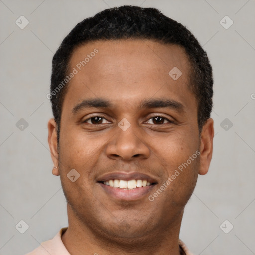 Joyful latino young-adult male with short  black hair and brown eyes