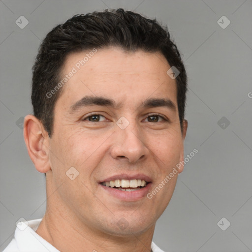 Joyful white adult male with short  brown hair and brown eyes