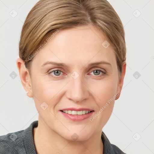 Joyful white young-adult female with short  brown hair and grey eyes