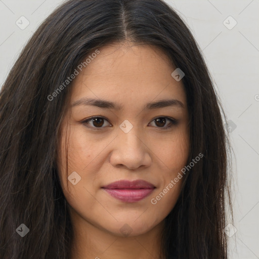 Joyful asian young-adult female with long  brown hair and brown eyes