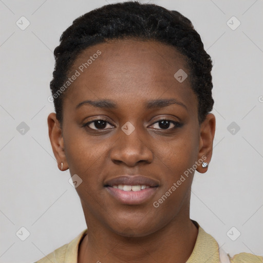 Joyful black young-adult female with short  black hair and brown eyes