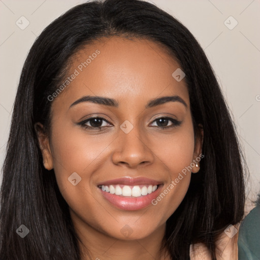 Joyful latino young-adult female with long  brown hair and brown eyes