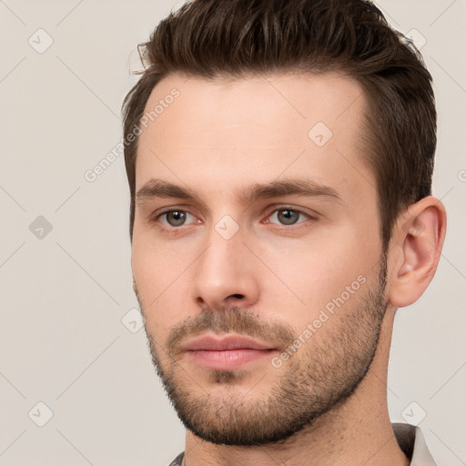 Neutral white young-adult male with short  brown hair and brown eyes