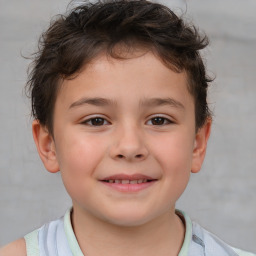 Joyful white child male with short  brown hair and brown eyes