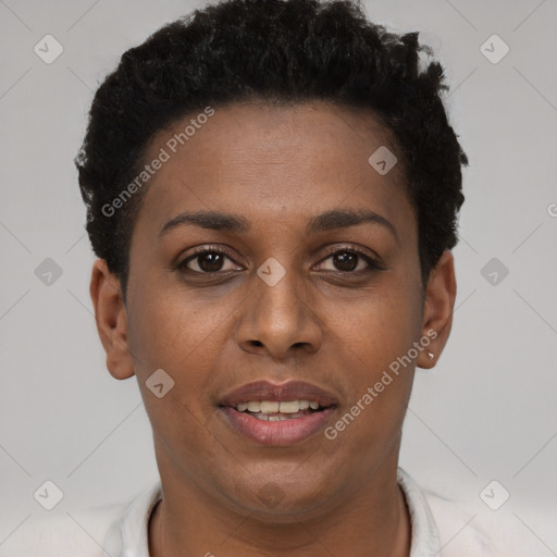 Joyful black young-adult female with short  brown hair and brown eyes