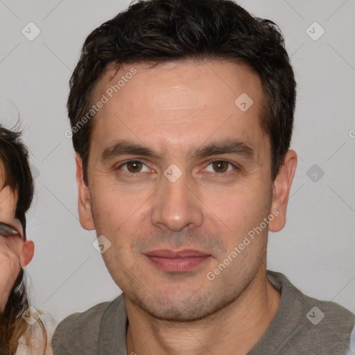 Neutral white young-adult male with short  brown hair and brown eyes