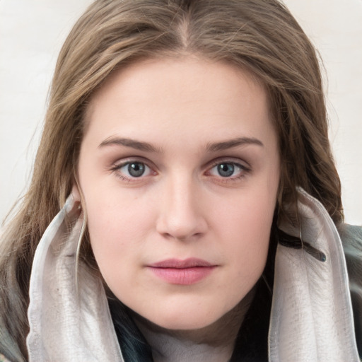 Neutral white young-adult female with long  brown hair and grey eyes