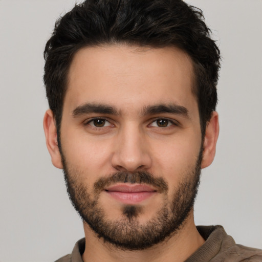 Neutral white young-adult male with short  black hair and brown eyes