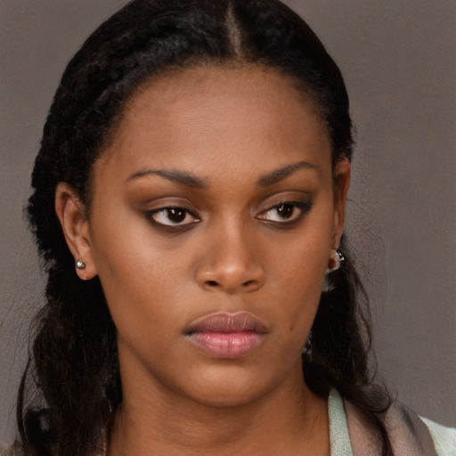 Neutral black young-adult female with long  brown hair and brown eyes