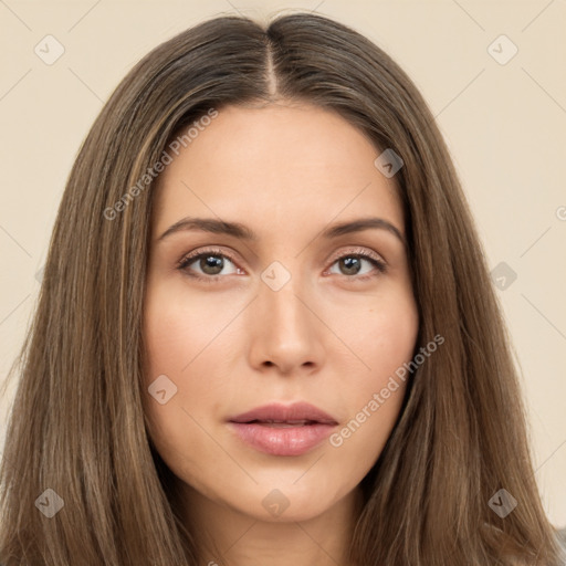 Neutral white young-adult female with long  brown hair and brown eyes